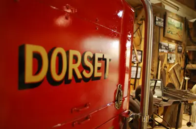 Image shows an antique fire truck with the word 'Dorset' on the side. 