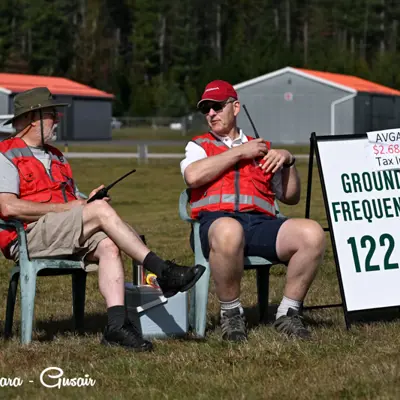 Image shows volunteer marshals at fly-in. 