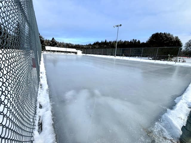 Image shows an outdoor ice rink.