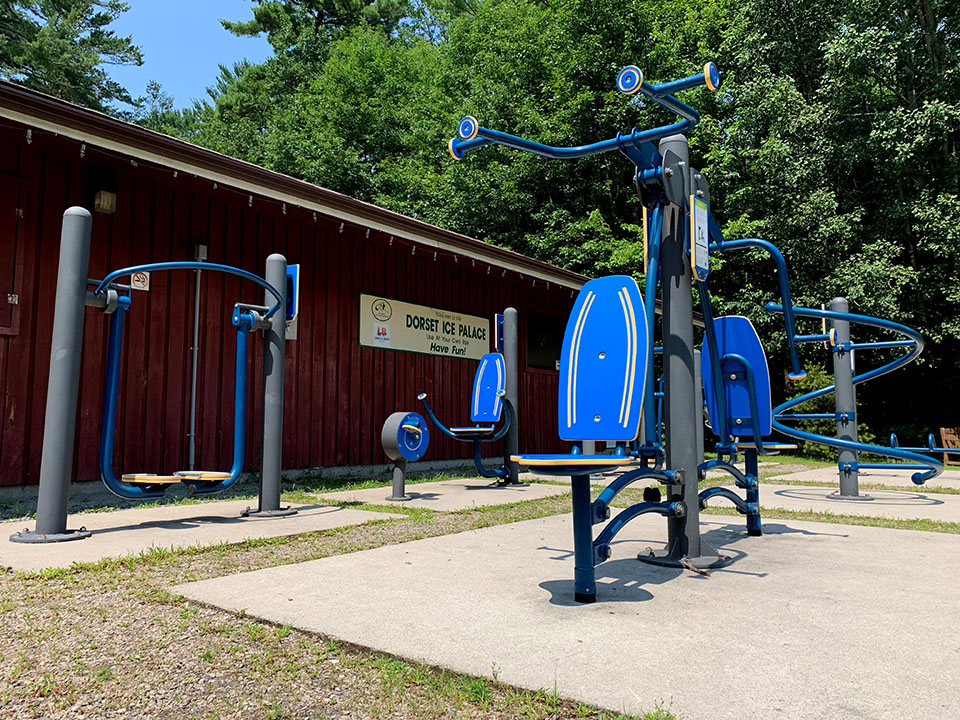 Image shows outdoor exercise equipment at Dorset Lions Centennial Park.