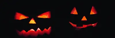 Image shows jack o'lantern at night. 