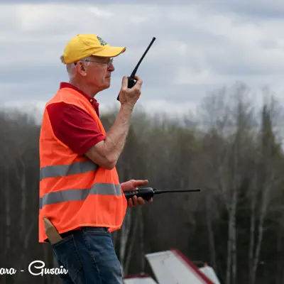 Image shows a volunteer controlling air traffic. 