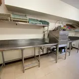Image shows the dishwasher in the main kitchen at Stanhope hall. 